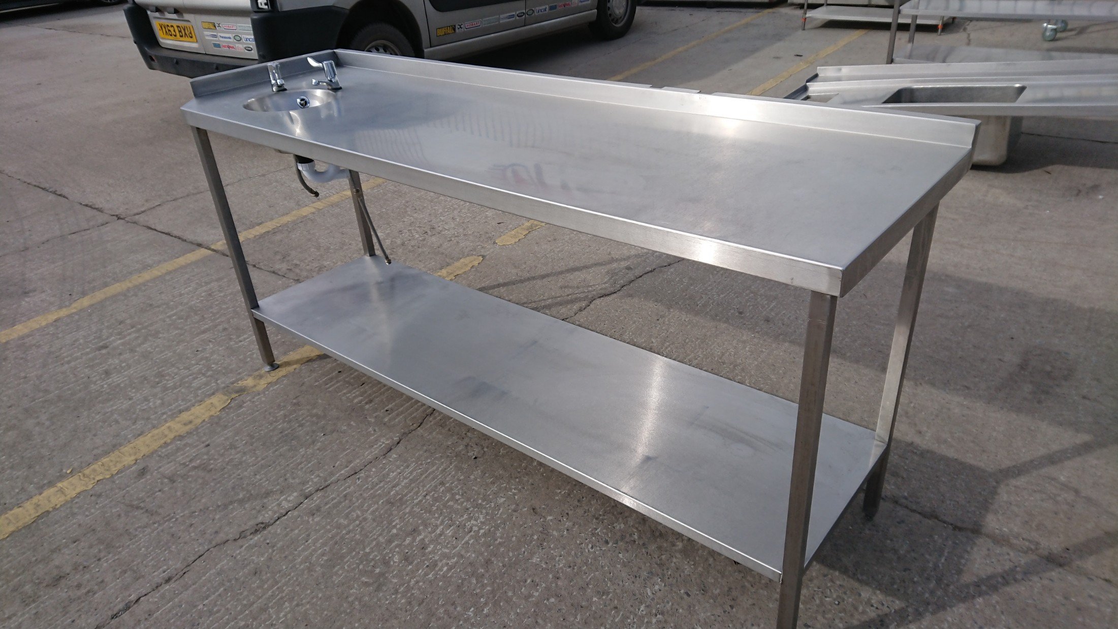 stainless kitchen table with sink